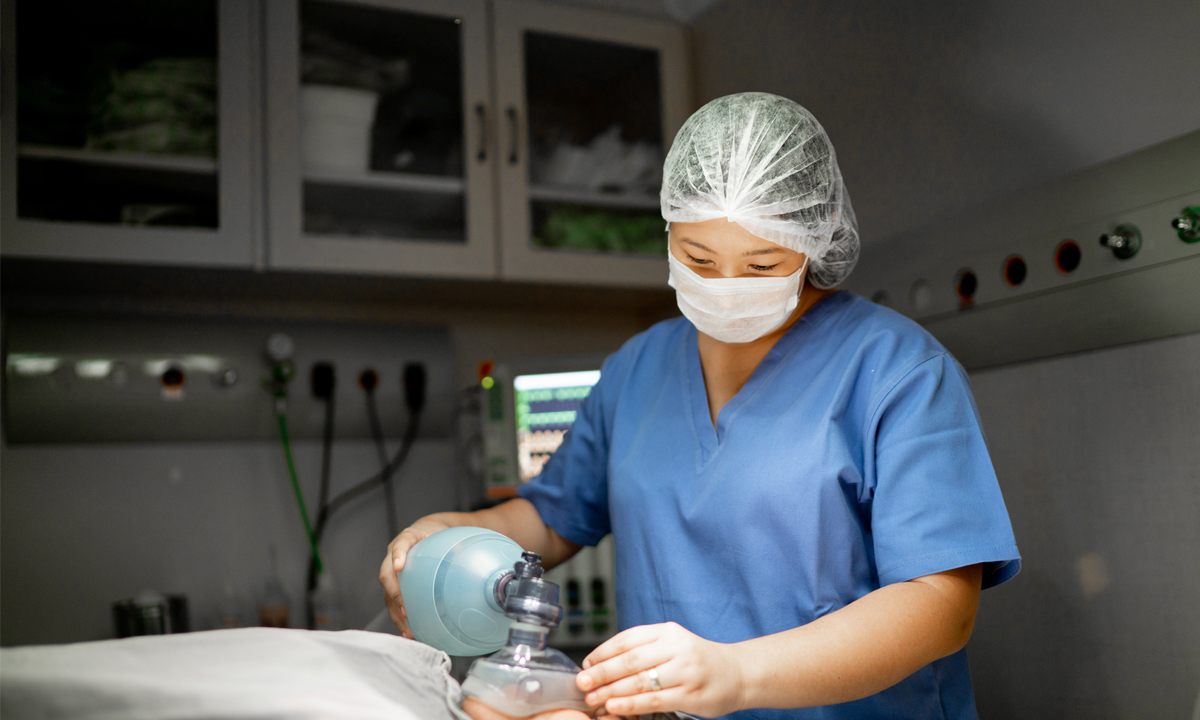 Health care professional preparing patient to surgery at operating room in hospital
