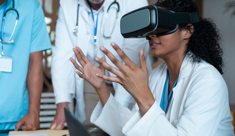 A doctor in training using virtual reality.